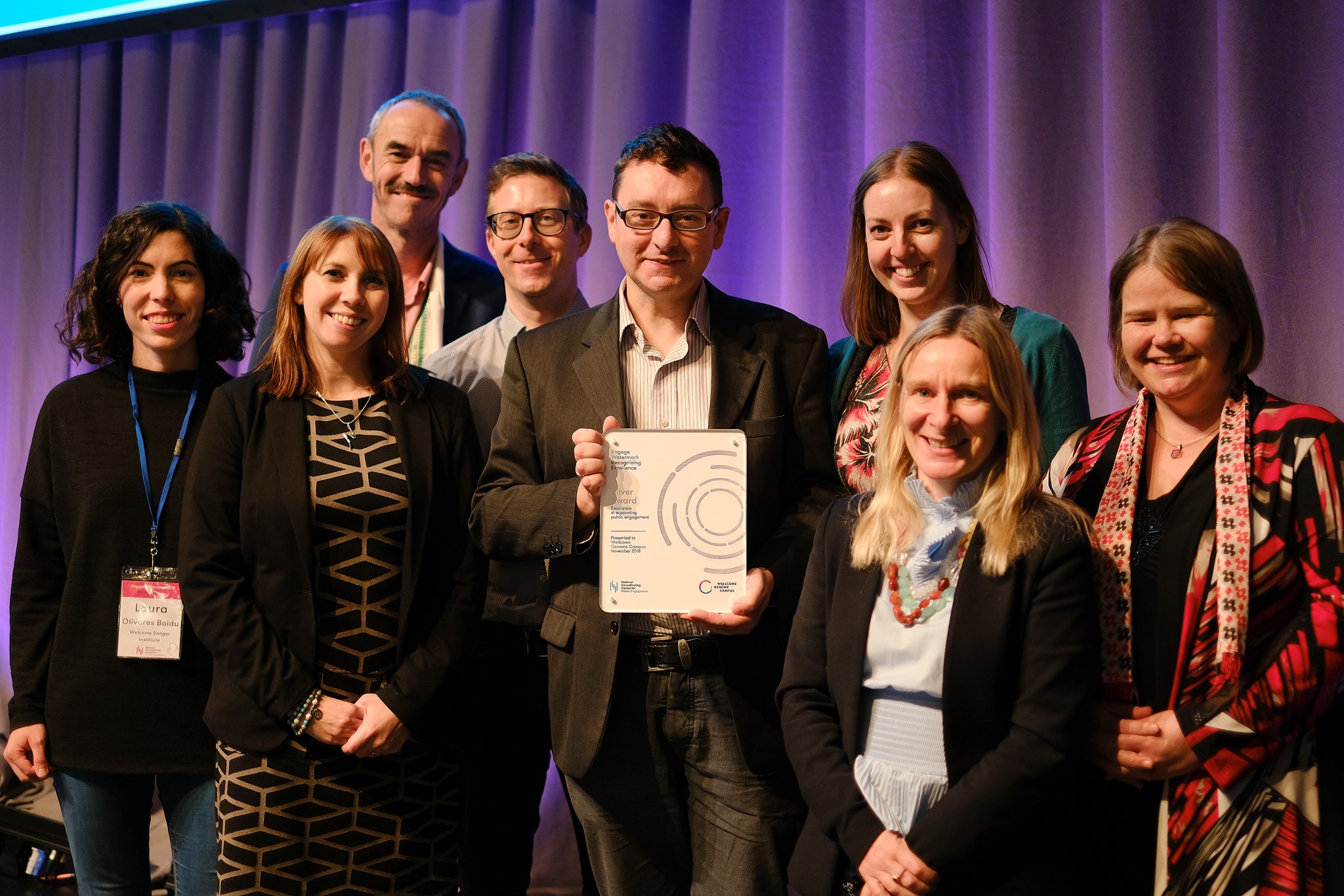 Wellcome Genome team accepting their Engage Watermark Award