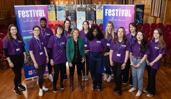 A group of people posing for a photo

AI-generated content may be incorrect.