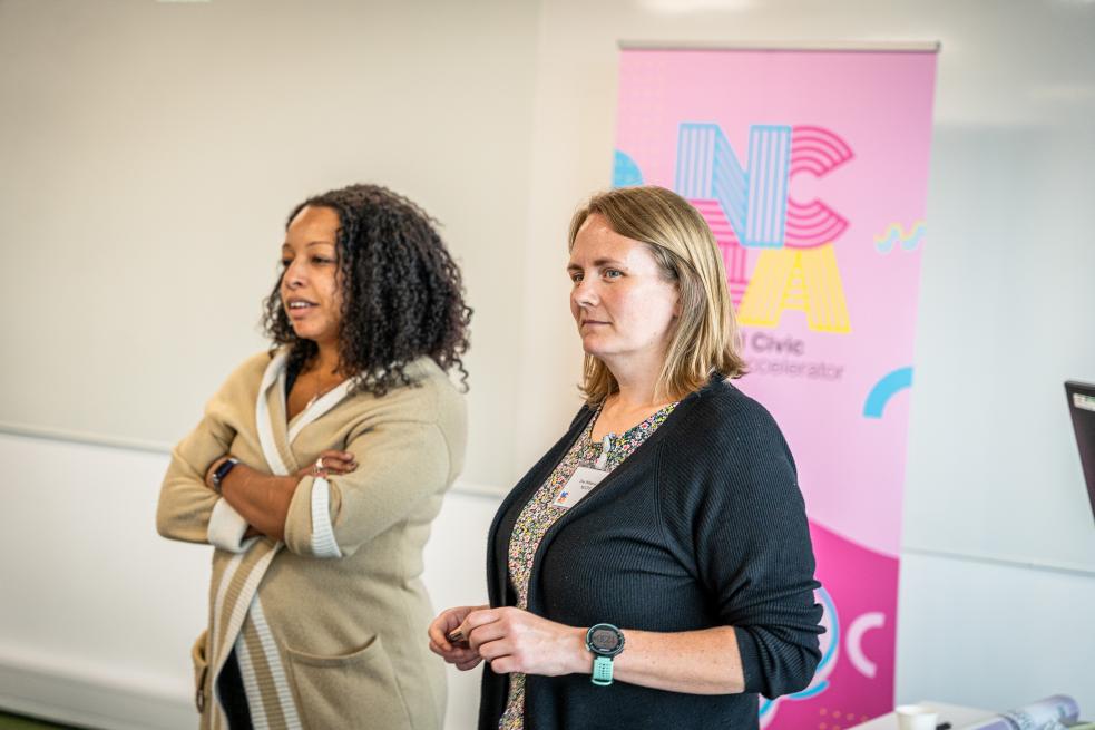 Gemma (left) and Zoe (right) presenting at an NCIA event 