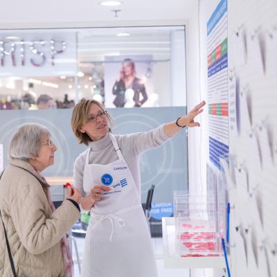 Nurse giving advice to elderly woman