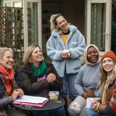 A group of women laughing together 